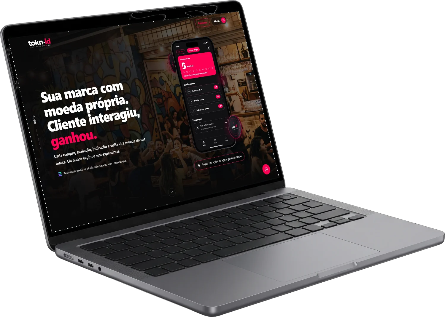Notebook com o site da tokn.id, feito pela Ideiaria